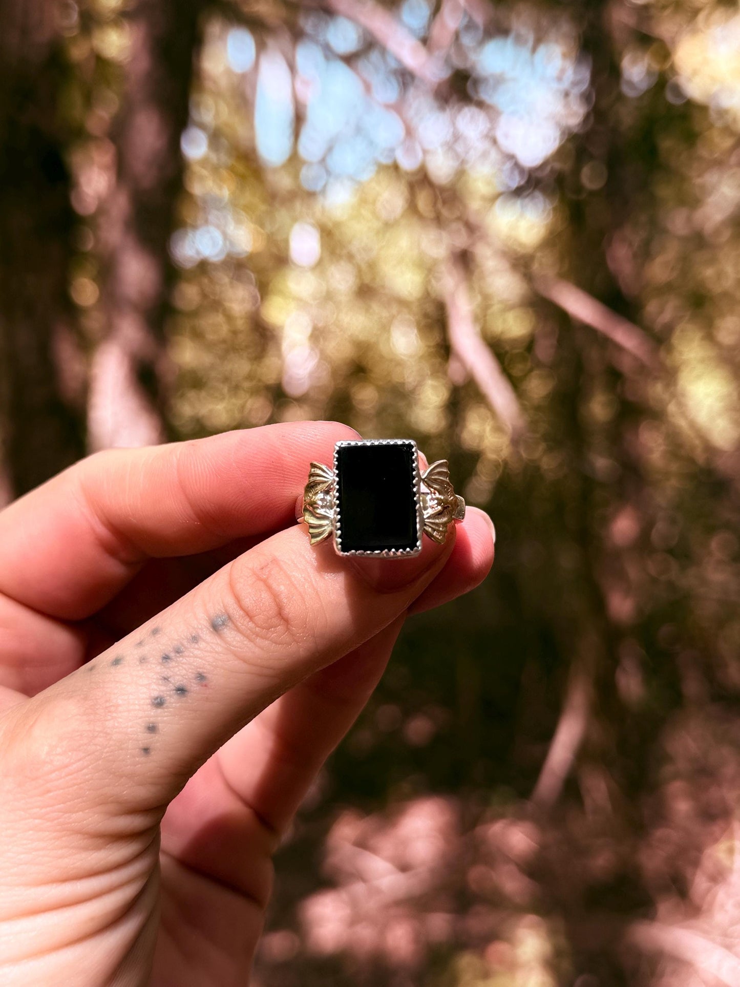 The Vamp Ring - Onyx mixed metal bat ring size 10