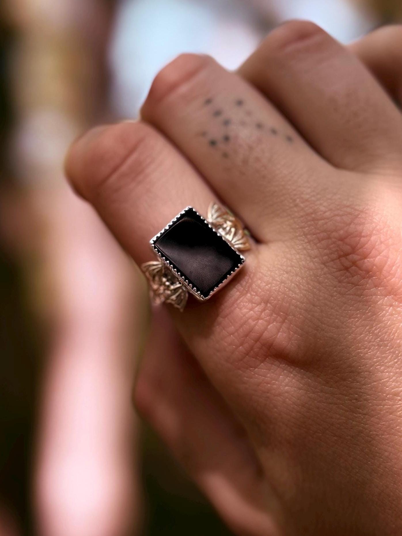 The Vamp Ring - Onyx mixed metal bat ring size 10