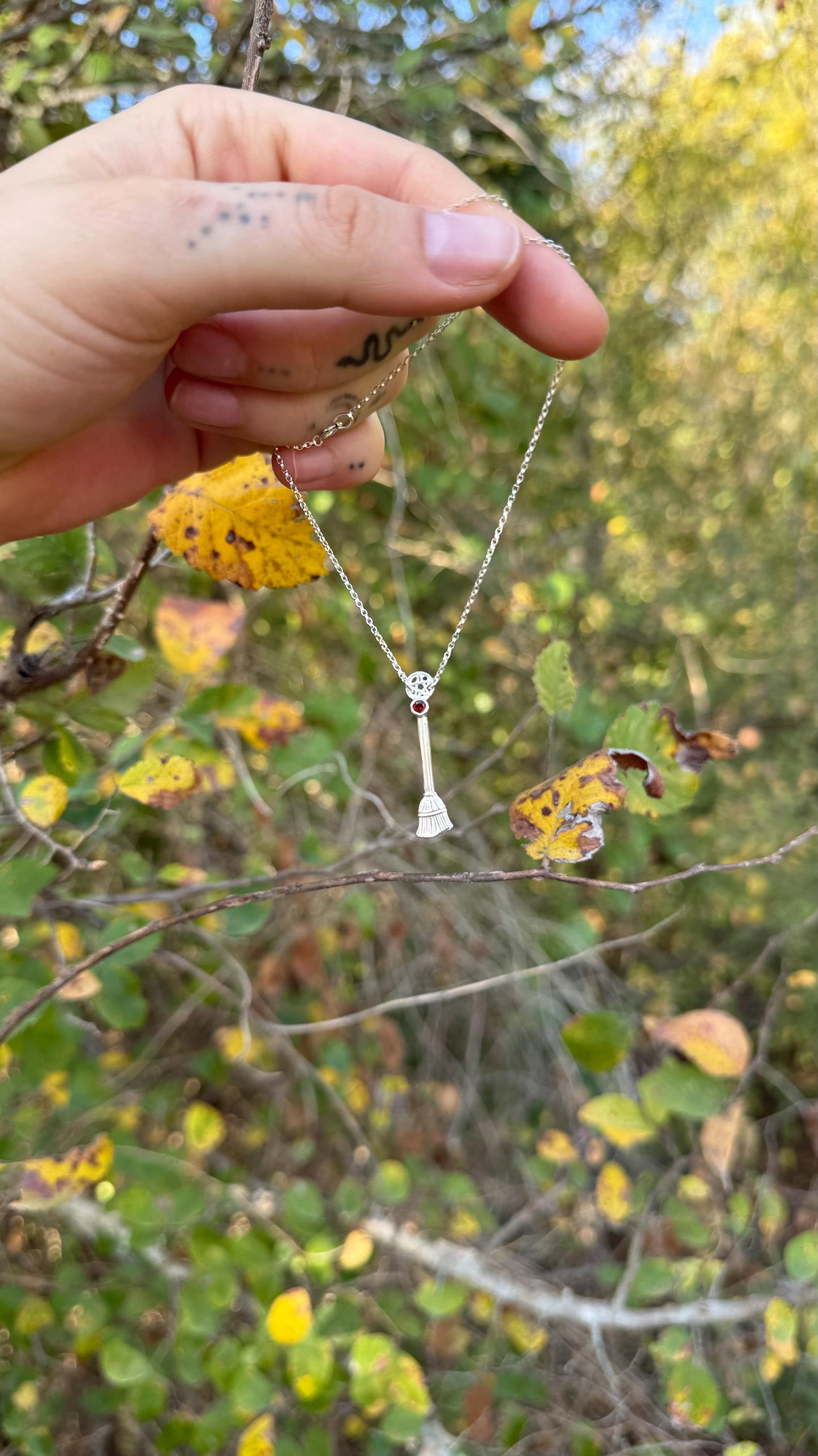 Manons Broom necklace • Crochan Witches Broom in sterling silver and garnet